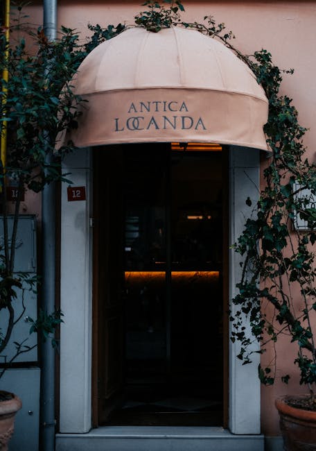 Entrance to Antica Locanda boutique hotel with a small 12 above the door